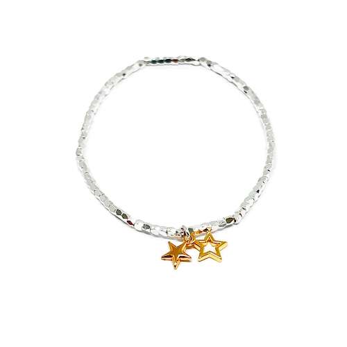 silver stretch bracelet with gold stars