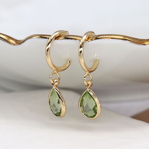 gold hoop and green crystal earrings